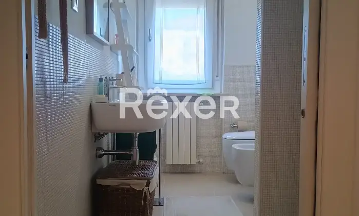 Rexer-Olgiate-Comasco-Trilocale-con-doppi-servizi-e-garage-Bagno