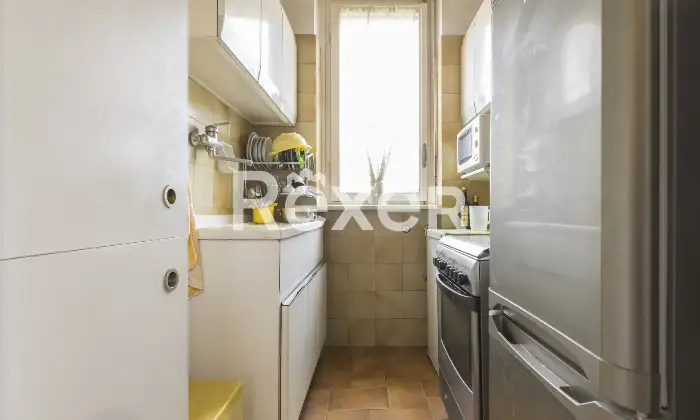 Rexer-Torino-TRILOCALE-ULTIMO-PIANO-CON-POSTO-AUTO-Cucina