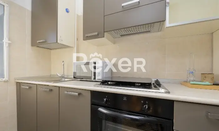 Rexer-Barzio-Accogliente-appartamento-con-ampio-balcone-e-box-Cucina