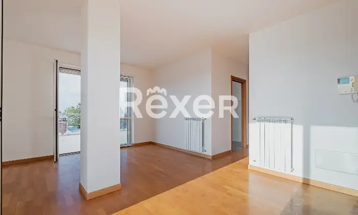 Rexer-Roma-Attico-in-via-Alessandro-Capalti-Soggiorno