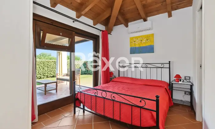 Rexer-Stintino-Porzione-di-villa-bifamiliare-con-ingresso-indipendente-piscina-privata-e-ampio-giardino-Camera-da-letto-matrimoniale
