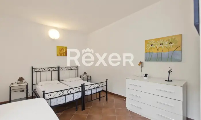 Rexer-Stintino-Porzione-di-villa-bifamiliare-con-ingresso-indipendente-piscina-privata-e-ampio-giardino-Camera-da-letto