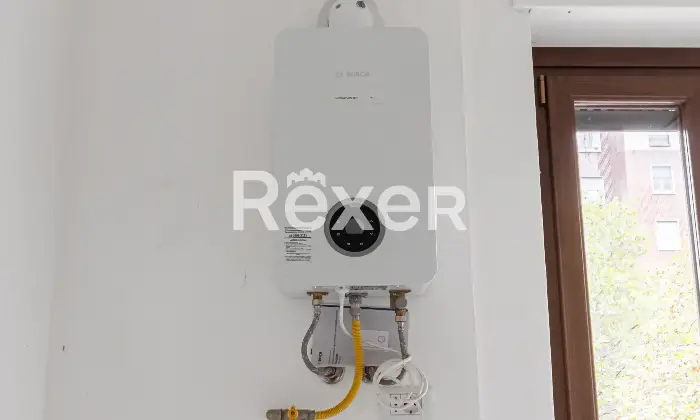 Rexer-Milano-Trilocale-con-cucina-e-balcone-di-mq-Dettagli
