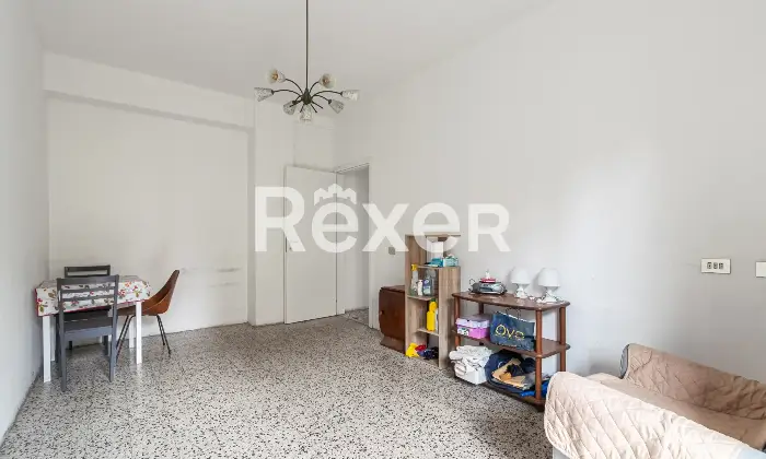 Rexer-Milano-Trilocale-con-cucina-e-balcone-di-mq-Sala