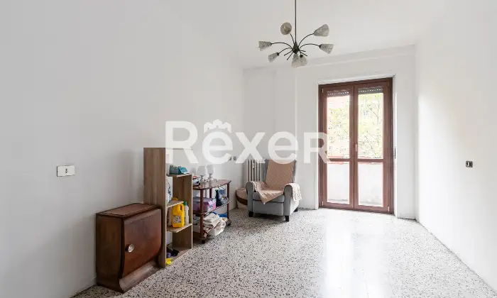 Rexer-Milano-Trilocale-con-cucina-e-balcone-di-mq-Soggiorno