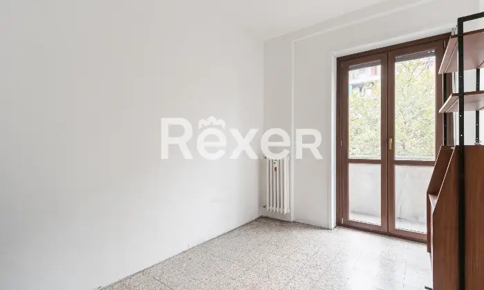 Rexer-Milano-Trilocale-con-cucina-e-balcone-di-mq-Camera-da-letto