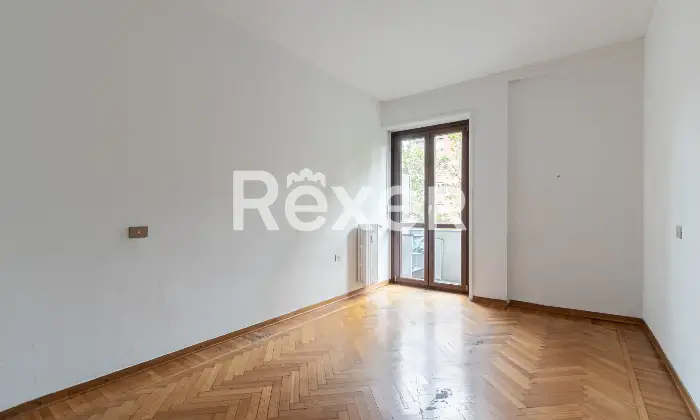 Rexer-Milano-Trilocale-con-cucina-e-balcone-di-mq-Camera-da-letto-matrimoniale