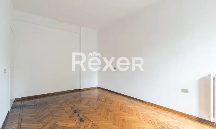 Rexer-Milano-Trilocale-con-cucina-e-balcone-di-mq-Camera-da-letto-matrimoniale