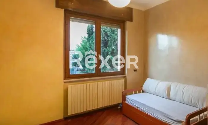 Rexer-Nova-Milanese-Trilocale-con-sottotetto-e-posti-auto-Camera-da-letto
