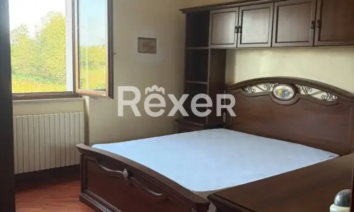 Rexer-Nova-Milanese-Trilocale-con-sottotetto-e-posti-auto-Camera-da-letto