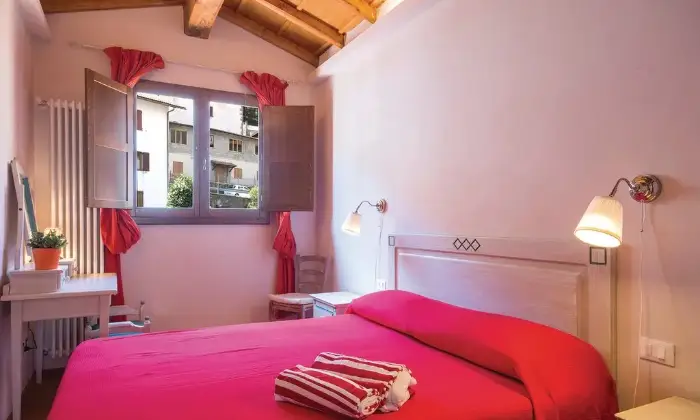Rexer-Abetone-Romantico-appartamento-in-montagna-CameraDaLetto