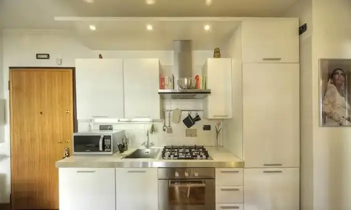 Rexer-Roma-Elegante-bilocale-con-solarium-e-terrazzo-zona-Giustiniana-CUCINA